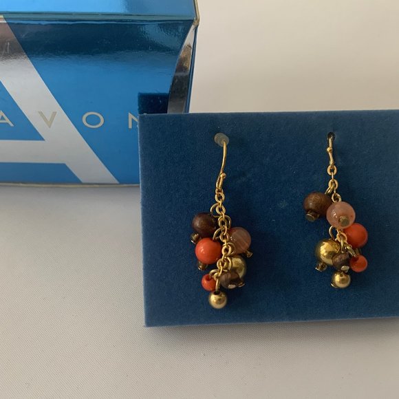 Avon Jewelry - Avon peachy shaky earrrings piereced NIB